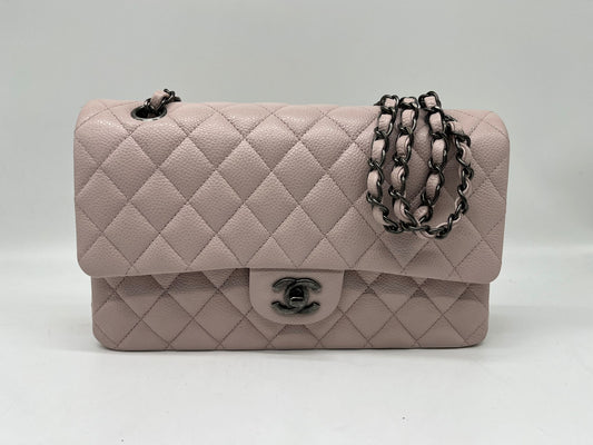 Chanel classic medium flap nudes caviar leather bag with ruthenium HW size 25
Year 2017
Pristine condition
Inclusions: authenticity card and entrupy certificate