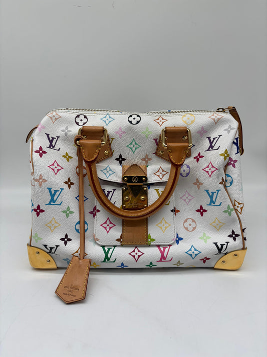 Louis Vuitton White Monogram Multicolore Canvas Speedy 30
In Very Good Condition
No Inclusions