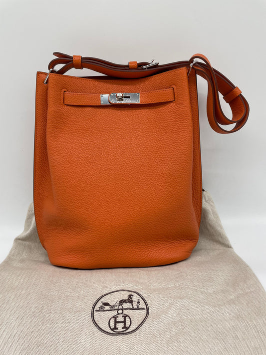 Hermes So Kelly Orange bag in Togo Leather Stamp X
Almost like new