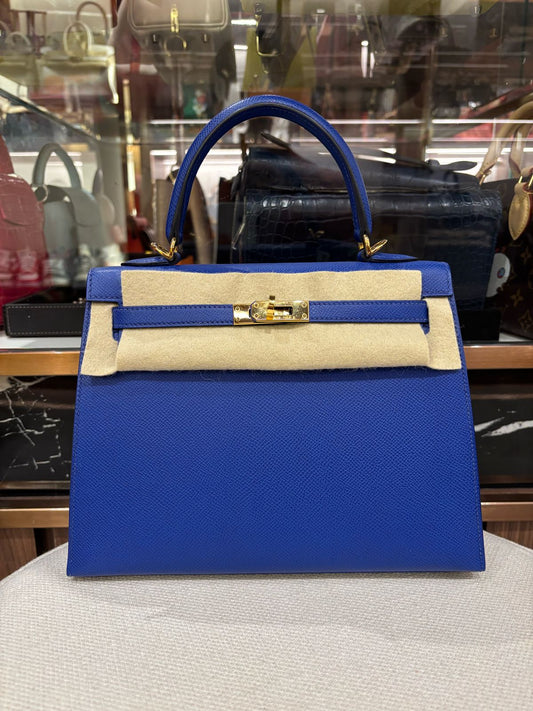 Hermes Kelly 25 
Blue Royal 
GHW 
Epsom 
U(2022) 
Pre Owned