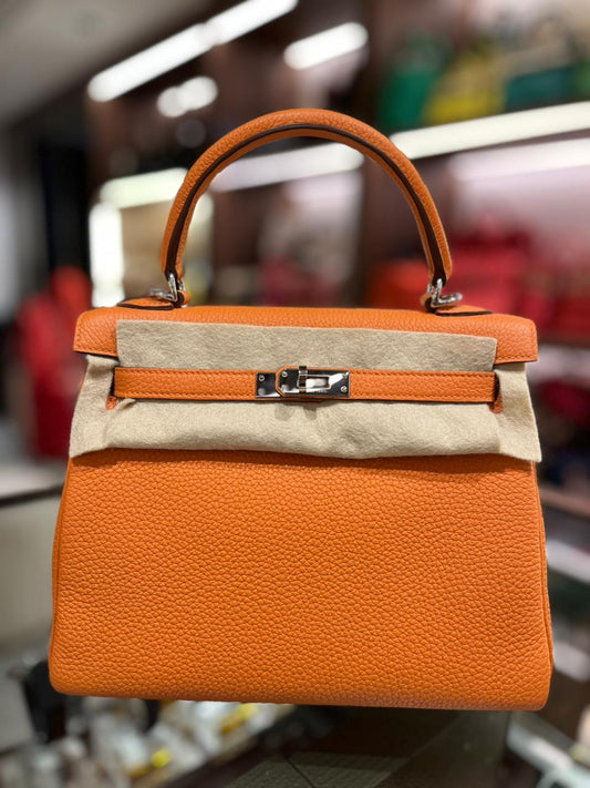 Kelly 25
Togo
Orange 
PHW
W(2024)
Preowned