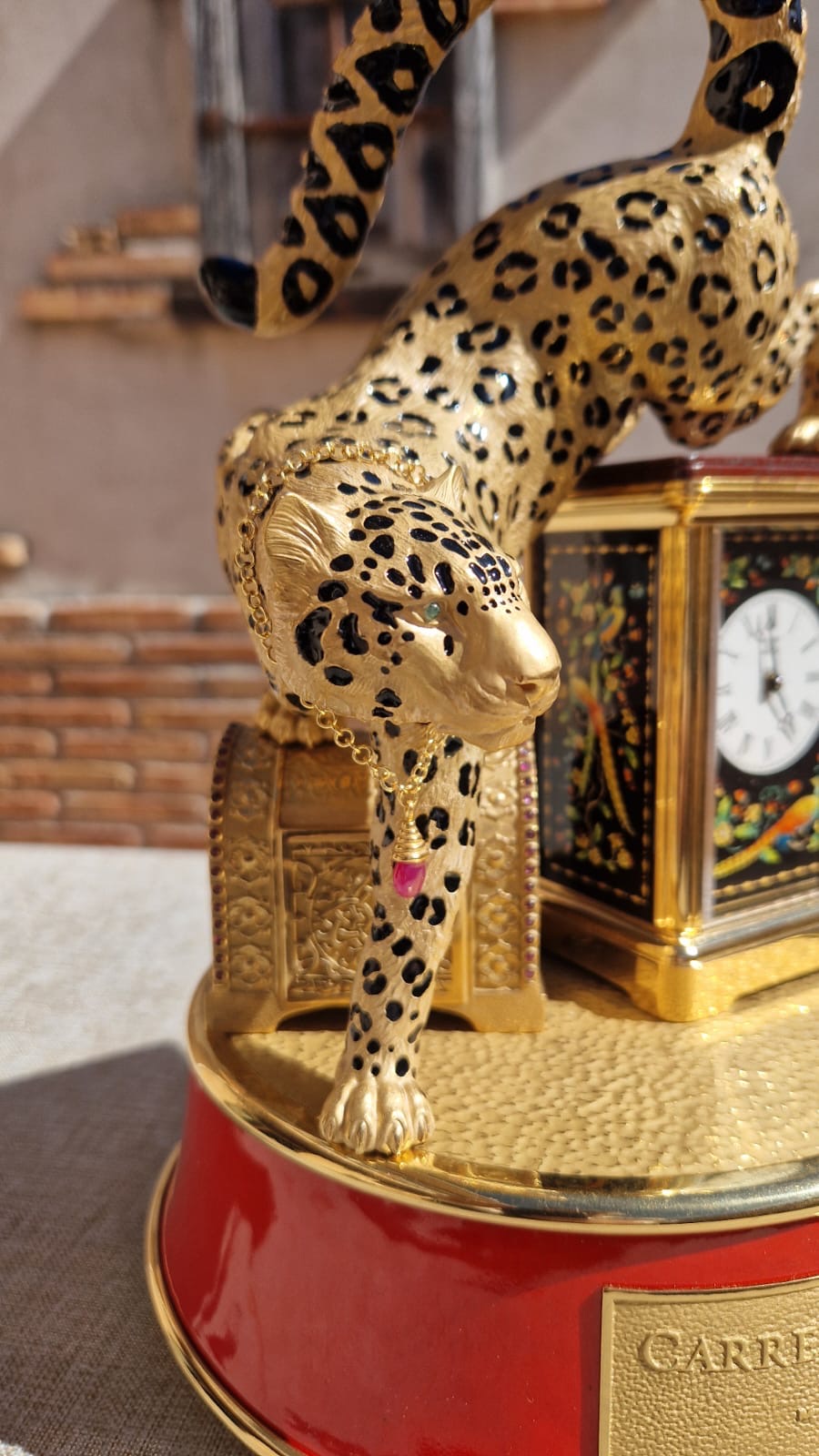 CARERERAY CARRERA 
Leopard with clock