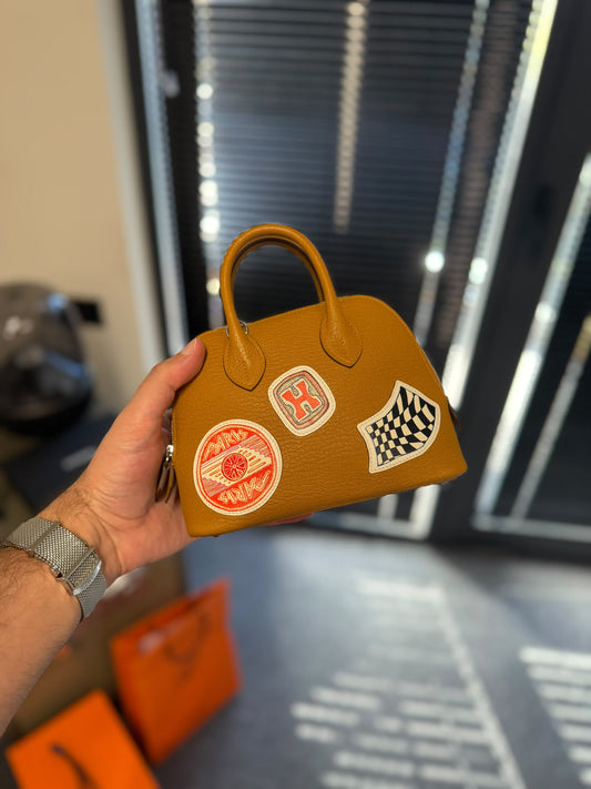 HERMÈS Limited Edition Mini Bolide 1923 Travel Caramel Chevre Palladium Hardware 2024 New