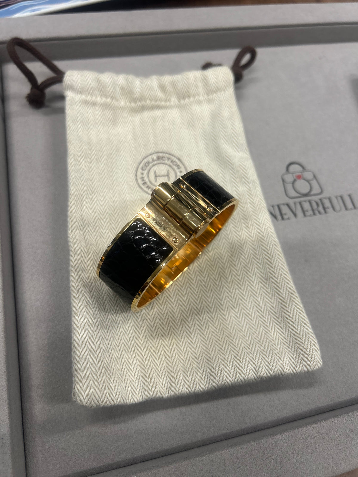 Hermès Black Leather & Gold-Tone Cuff Bracelet