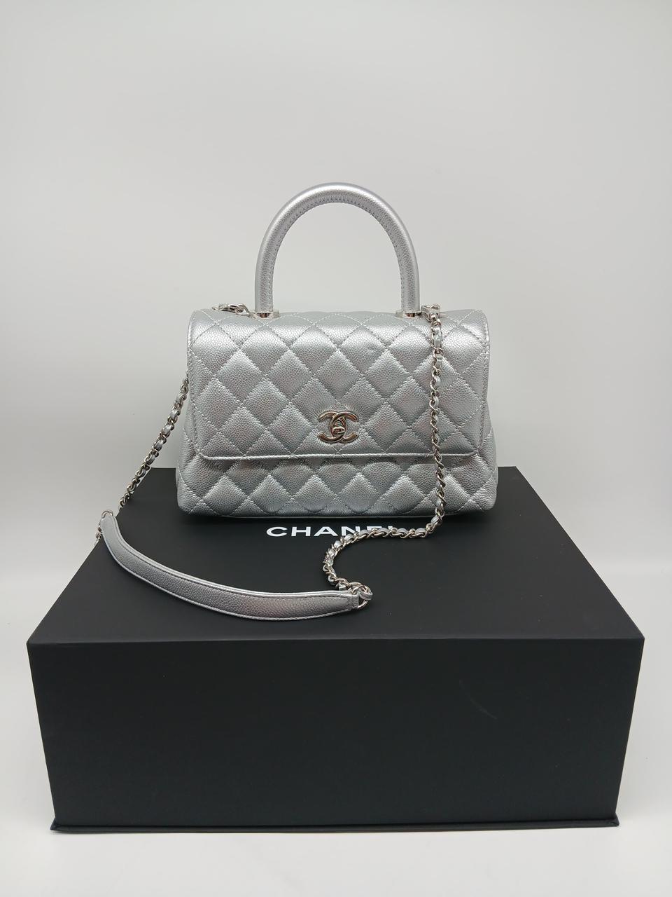 Chanel Metallic Caviar Quilted Mini Coco Handle Flap Silver
Micro chipped
Like New 
Inclusions: Box, Dustbag