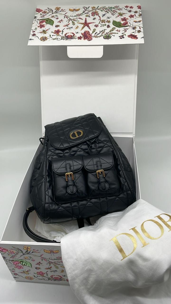 Dior caro backpack in black microcannage lambskin
Excellent condition 
Comes with Box and Dustbag