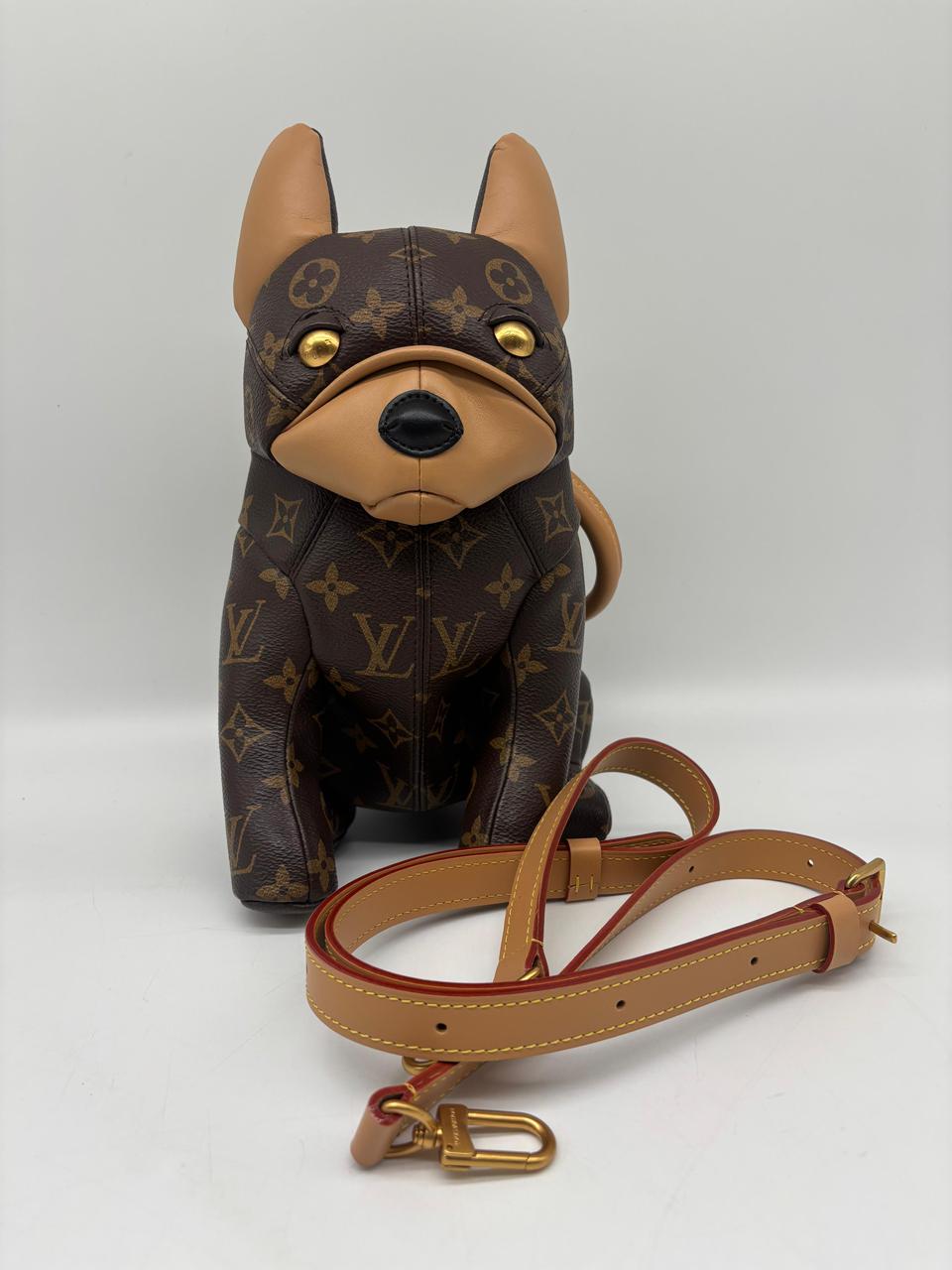 LV Pooch Bag in Monogram Coated Canvas ST
In Pristine Condition
Inclusions: Strap, Box, Dustbag