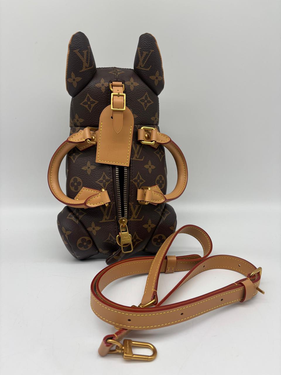 LV Pooch Bag in Monogram Coated Canvas ST
In Pristine Condition
Inclusions: Strap, Box, Dustbag