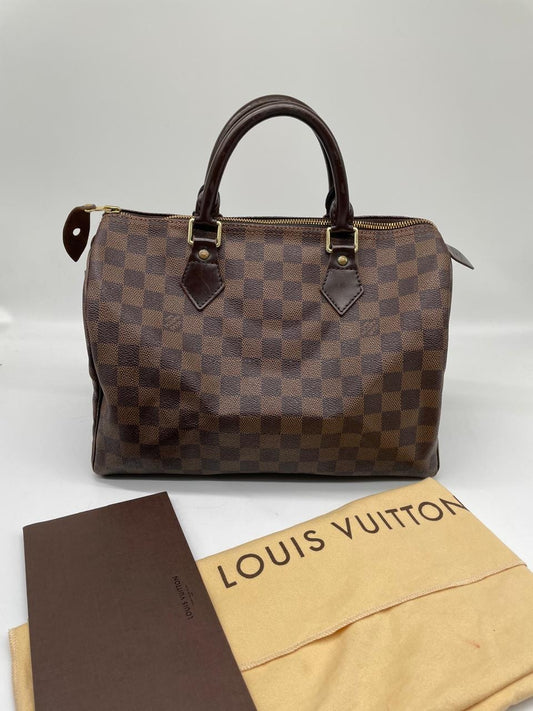 Louis Vuitton Damier Ebene Speedy 30 Bag
Pristine Condition
Inclusions: Invoice and Dust Bag