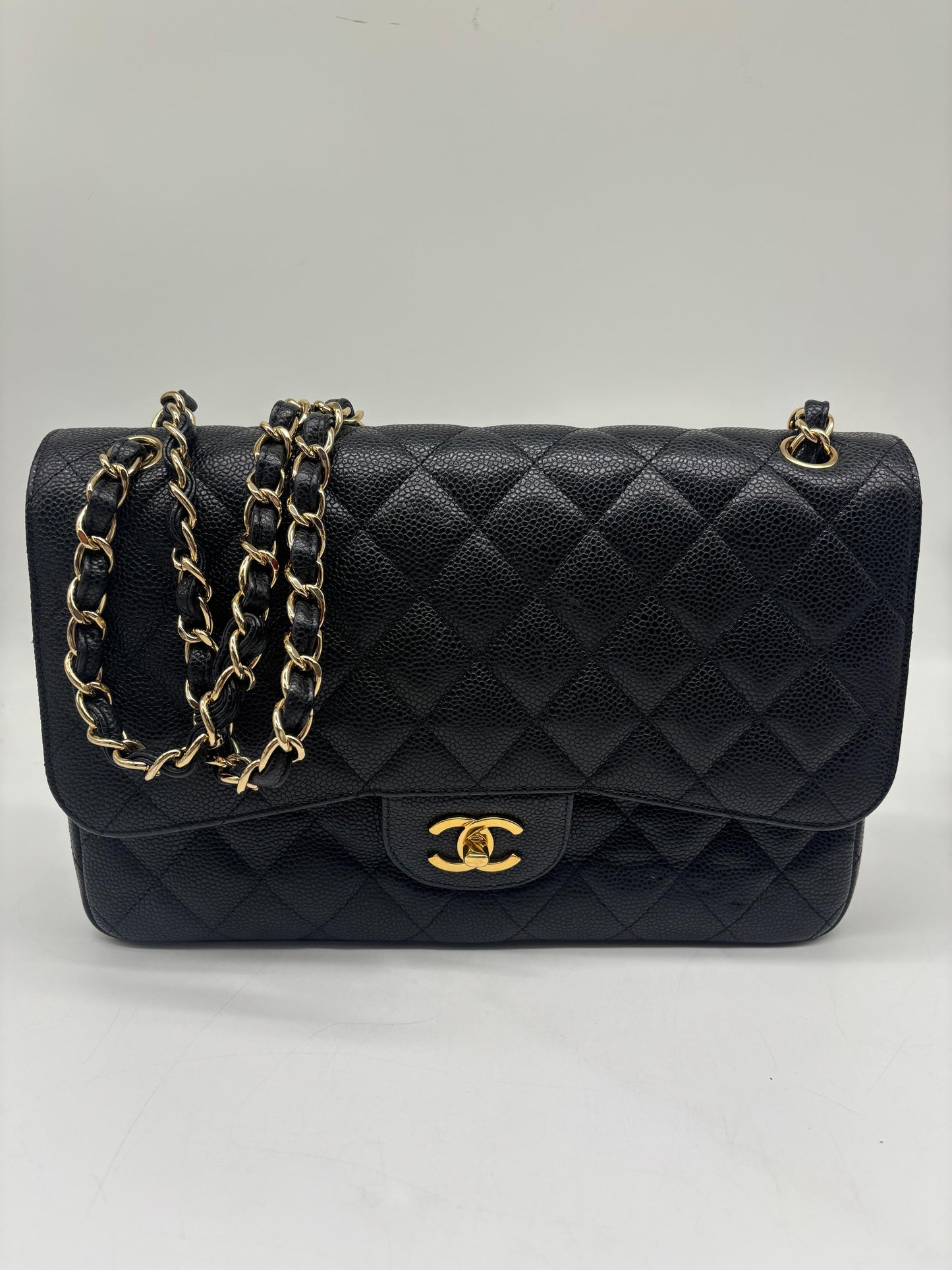 Chanel Black Jumbo Classic Double Flap Quilted Caviar Leather black
In Excellent Condition
Inclusions: Dustbag