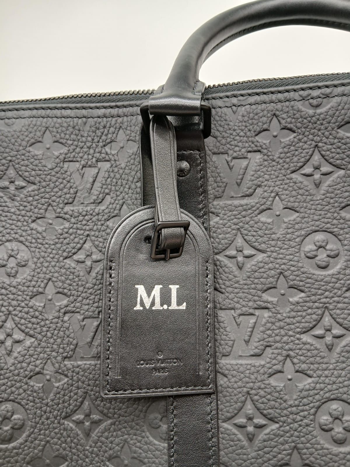Louis Vuitton Monogram Black Taurillon Keepall Bandouliere 50 black RFID

Pristine Condition/ Almost like new
(M.L initials in the tag)