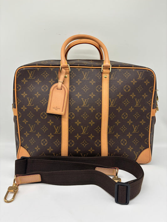Louis Vuitton Monogram Coated Canvas Cupertino Briefcase
Unused
Inclusions: Dustbag, Strap