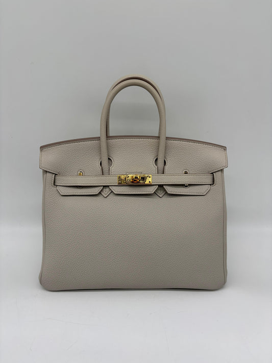 Hermès Birkin 25 in Beton Togo leather with Gold HW
Stamp Z (2021)
In Pristine Condition
Comes In Full Set With Store Receipt