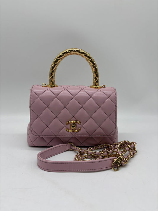 Chanel Pink Lambskin Clutch with Chain Microchip
In Excellent Condition 
Comes With Box, Dustbag, Strap