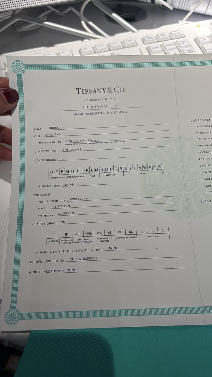 Tiffany & Co Pt950 Diamong Ring 1.72ct H VS1 3EX 5.40g
Size 5 (US)
Comes With: Box, Certificate and Store Receipt